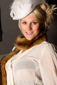 an older woman has her boobs exposed while riding a hard cock